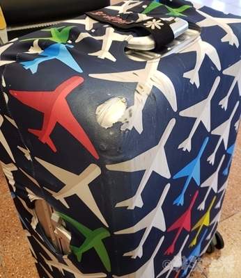 旅行　スーツケースカバー　ラゲージカバー　LOQI　ローキー 　ロストバゲージ　ヒースロー空港